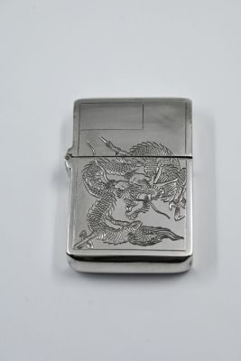 Zippo silver lighter, with hand-engraved pagoda decoration and on the other side a passport 