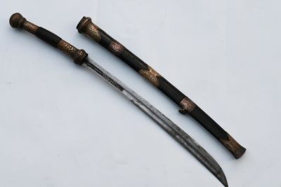 A Burmese sword made of steel, the end of the 19th century, a Burmese sword with a sheath 