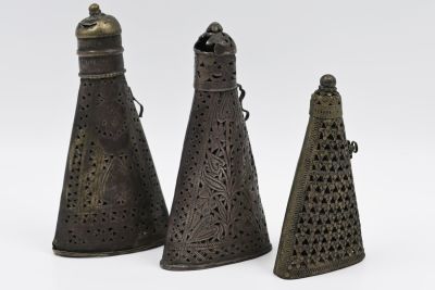 Silver Indo-Persian Sword Handles 
Lot of three antique silver Indo-Persian sword handles. 