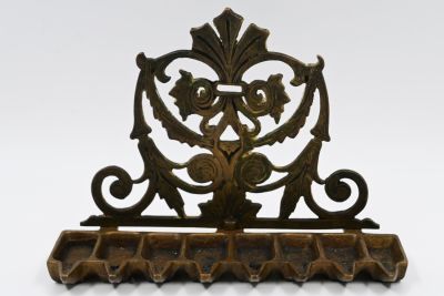 Italian Chanukah 
An Italian menorah made of cast brass, the back of the menorah is openwork 