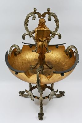 Gold and silver plated bronze centerpiece. France, circa 1900. 
In the center is a bronze 