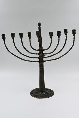 Menorah - silver-filigree 
An upright menorah. Land of Israel, [20th century]. 
silver, 