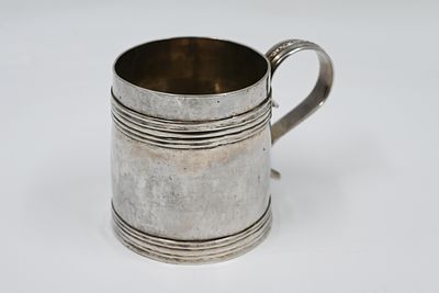 Victorian Silver Mug 
English Silver Mug, London, Signed, circa 1850. Decorated with two 