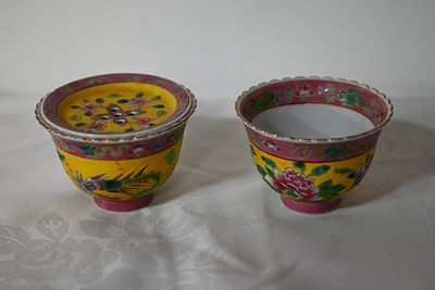 Pair of dishes, cup and strainer, Chinese porcelain, handmade, Marked, height 9 cm.