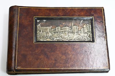 Leather album, relief by Moshe Moro (Bezalel) 
Leather album, 1920s. The album with a leather 