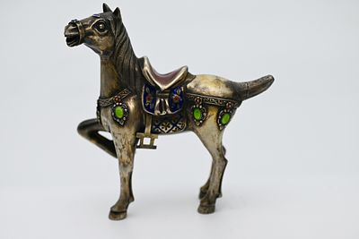Silver Horse Statue 
A horse statue made of silver, handmade by a silversmith in the shape of a 