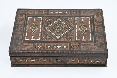 Damascus wooden box. 
An elegant Damascus wooden box for chess and backgammon, inlaid with 