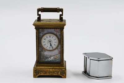 Miniature enamel table clock 
A miniature Viennese table clock made of silver and enamel, late 