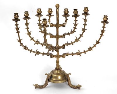 Upright Menorah - Holland, early 20th century 
Upright brass menorah with removable reeds. A 