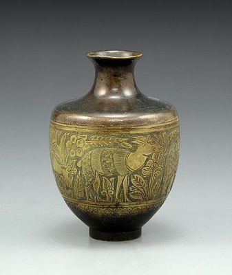 Brass jug made by Alfred Salzman. Signed, decorated with engravings of animals and plants. 