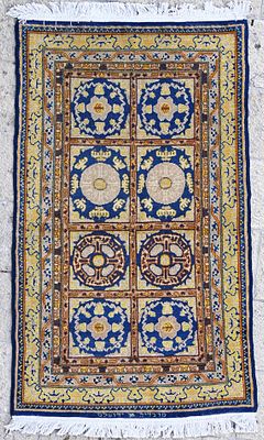 Carpet made by "Marvadia" – Seven-branched lamps – Bezalel Jerusalem, early 1920s 
A carpet 
