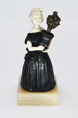 Erika Pucher (Austrian) 
Erika Pucher (Austria), signed, figure of a girl with a bouquet of 