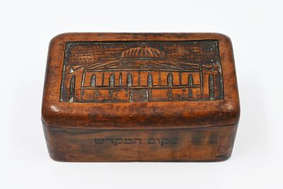 A tobacco box made of olive wood, early 20th century, decorated with a carving of the Temple 