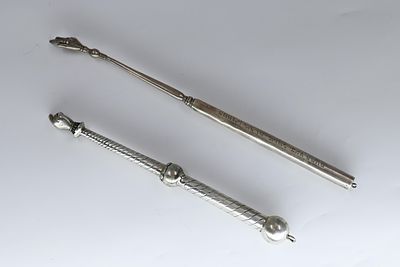 Silver Torah Scroll Hands 
Lot of 2 silver Torah scroll hands. Made of sterling silver, one of 