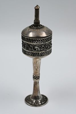 Silver perfume tower decorated with filigree work. 
The body of the tower is decorated at 