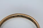 18K gold wedding ring, signed. 
Weight: 2.32 grams. 
Size 22.Image - 2