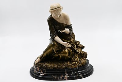 An antique, high-quality French bronze statue from the 19th century, combined with a luxurious 