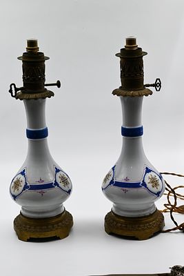 Pair of Delft table lamps. Europe, signed. Early 20th century, handmade porcelain Height: 50 cm