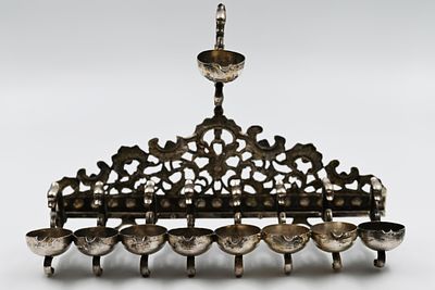 Hanukkah Menorah with Swan Decorations – Italy, 19th Century 
Silver Hanukkah Menorah. Italy 