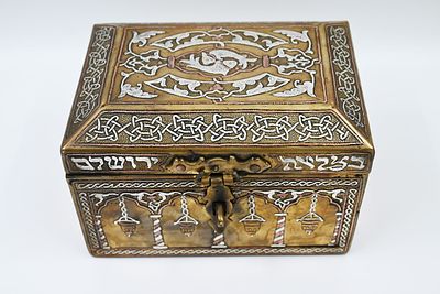 A large and impressive jewelry box made of copper in Damascus work, with silver decorations of 