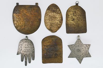 6 low silver amulet pendants, Eastern countries. 
A set of 6 amulet pendants, decorated with 