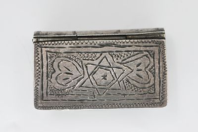 Moroccan Silver Tobacco Box 
A luxurious silver tobacco box in the shape of a book with 