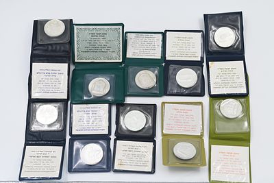 A set of silver coins and medals of the government company. 
A set of silver coins and medals 