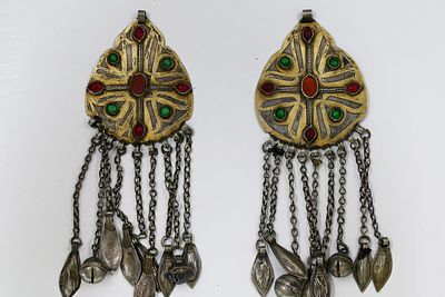 Turkmen Earrings 
Turkmen Earrings. Tenetschir made of silver. Decorated with stone inlays and 