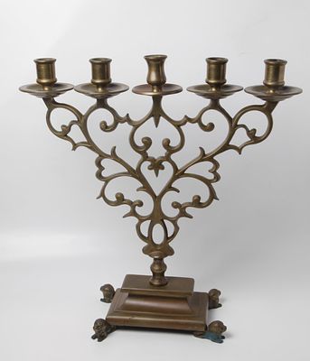 A five-reed lamp for a synagogue, Poland , the body of the lamp is decorated with open flora 