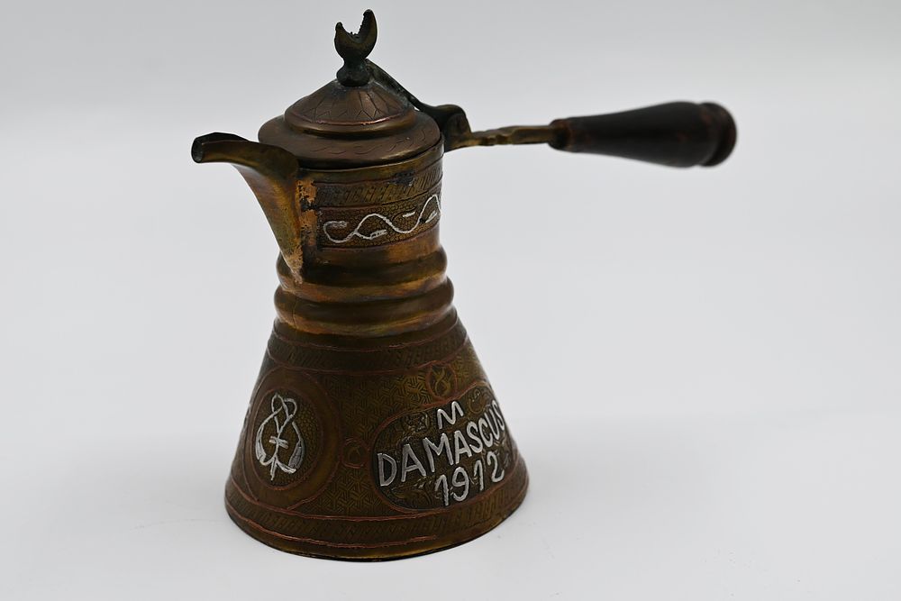 Pinjan in Damascus work. 
Inlaid with silver and copper in the Damascus technique. Decorated 