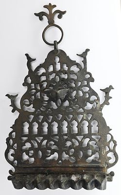 North African (Morocco) bronze menorah, early 20th century. Decorated with missing work and 