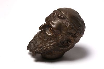 Handle in the shape of a Jewish head of a walking stick 
Bronze handle in the shape of a Jewish 