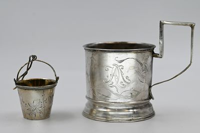 Two Russian silver items 
1. Tea strainer made of 84 Russian silver from the times of the 