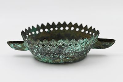 Antique Bronze or Copper Oil Lamp - Seljuk Period 
The design of the serrated edges with the 