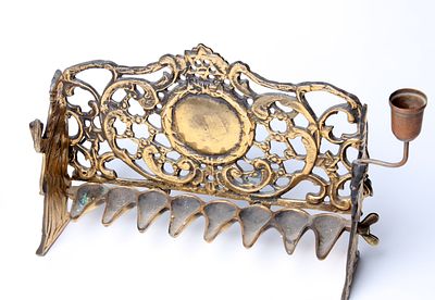 Menorah in Bohemian design, from Prague from the 18th century, the back of menorah is decorated 