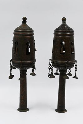 Pairs of pomegranates for a Torah book. Morocco, early 20th century. 
A pair of pomegranates 