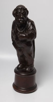 Grotesque and distorted anti-Semitic wooden statue, 
Hand-carved dark wood statue, signed 