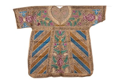 An Ottoman Talismanic Shirt with Multicolored Calligraphic Inscriptions and Floral Motifs. A 
