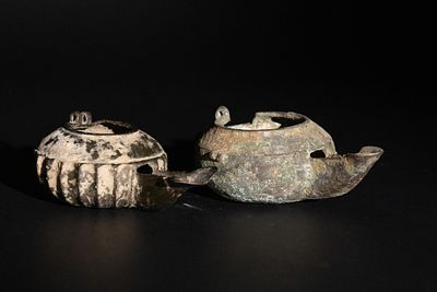 **NO RESERVE** A Pair of Islamic Khorassan Bronze Oil Lamps, 12th Century. A pair of Islamic 
