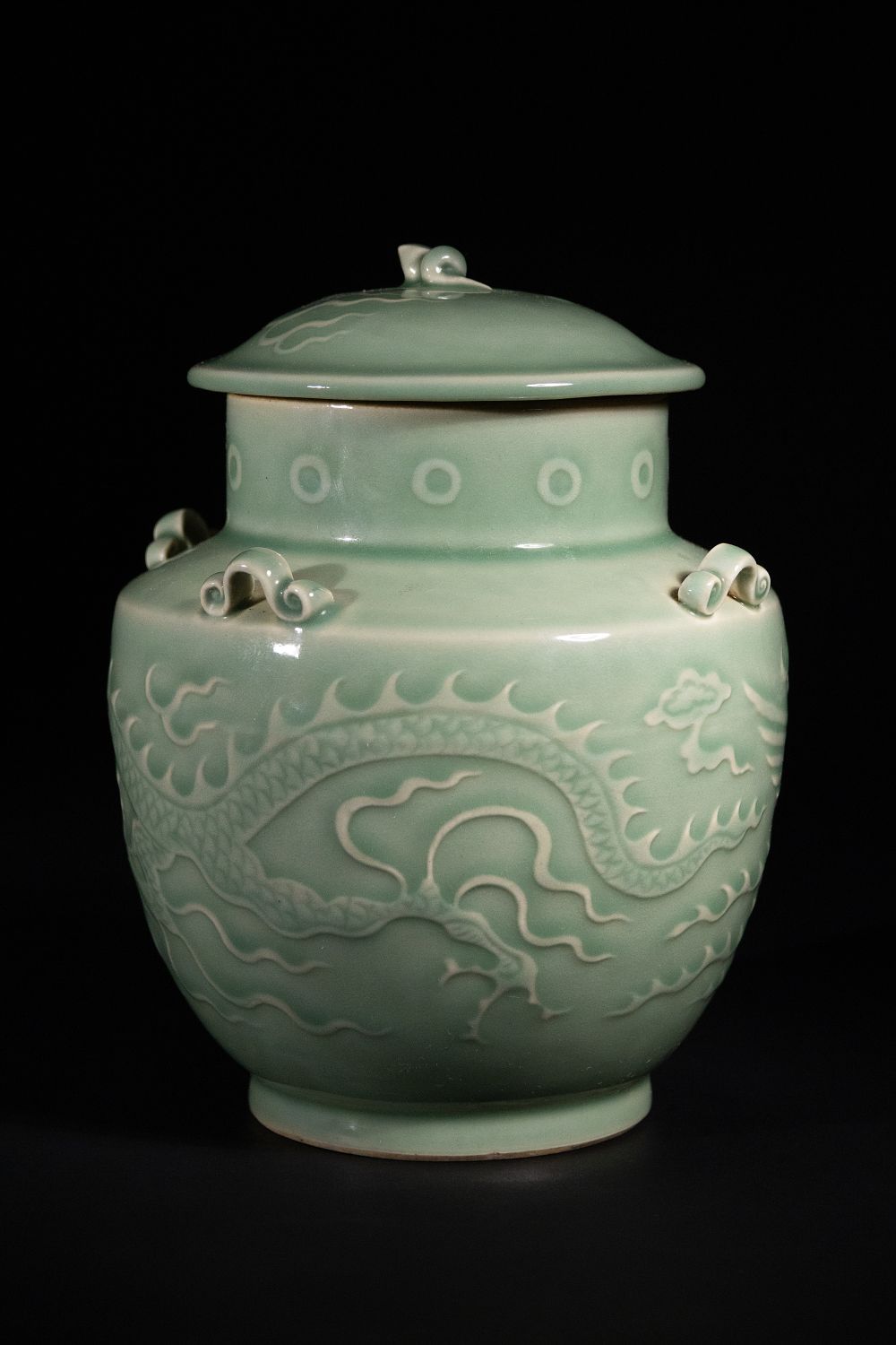 A Chinese Longquan Kiln Celadon Porcelain Dragon and Phoenix Jar, Possibly Yuan Dynasty. A 