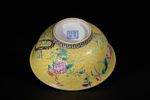 A Chinese Famille Rose Yellow-Ground Bowl, Kangxi Mark. A polychrome porcelain bowl with a deep Image - 3