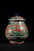 A Chinese Wucai Porcelain Dragon Jar with Lid, featuring a globular body and a domed lid topped Image - 1