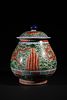 A Chinese Wucai Porcelain Dragon Jar with Lid, featuring a globular body and a domed lid topped Image - 2