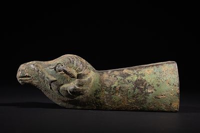 A Chinese Bronze Zoomorphic 'Tiger's Head' Fitting, Possibly Zhou Dynasty. A Chinese bronze 