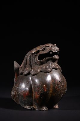 A Chinese Bronze Foo Dog Incense Burner. A Chinese bronze foo dog incense burner, cast as a 