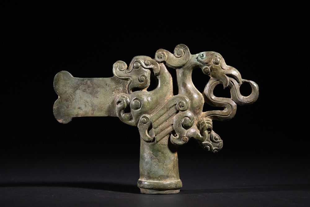 An Archaic Bronze Mythical Beast Ceremonial Finial, Possibly Spring and Autumn / Warring States 