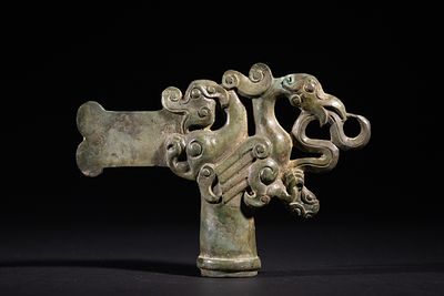 An Archaic Bronze Mythical Beast Ceremonial Finial, Possibly Spring and Autumn / Warring States 