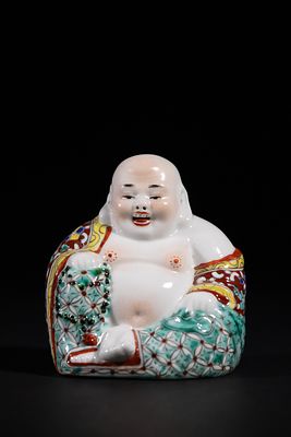 A Chinese Famille Rose Porcelain Maitreya Buddha Figurine. A Chinese Famille Rose porcelain 