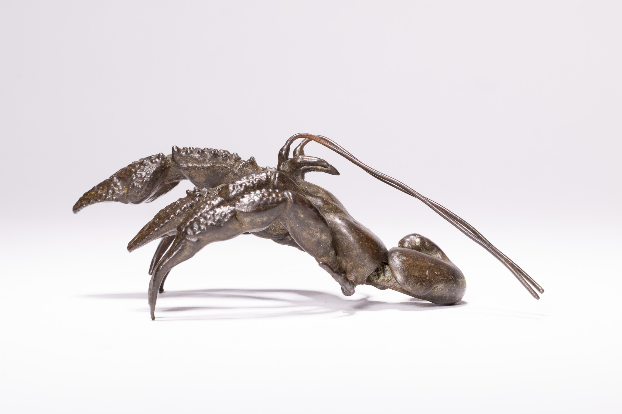 A JAPANESE BRONZE ARTICULATED MODEL OF A CRAYFISH.