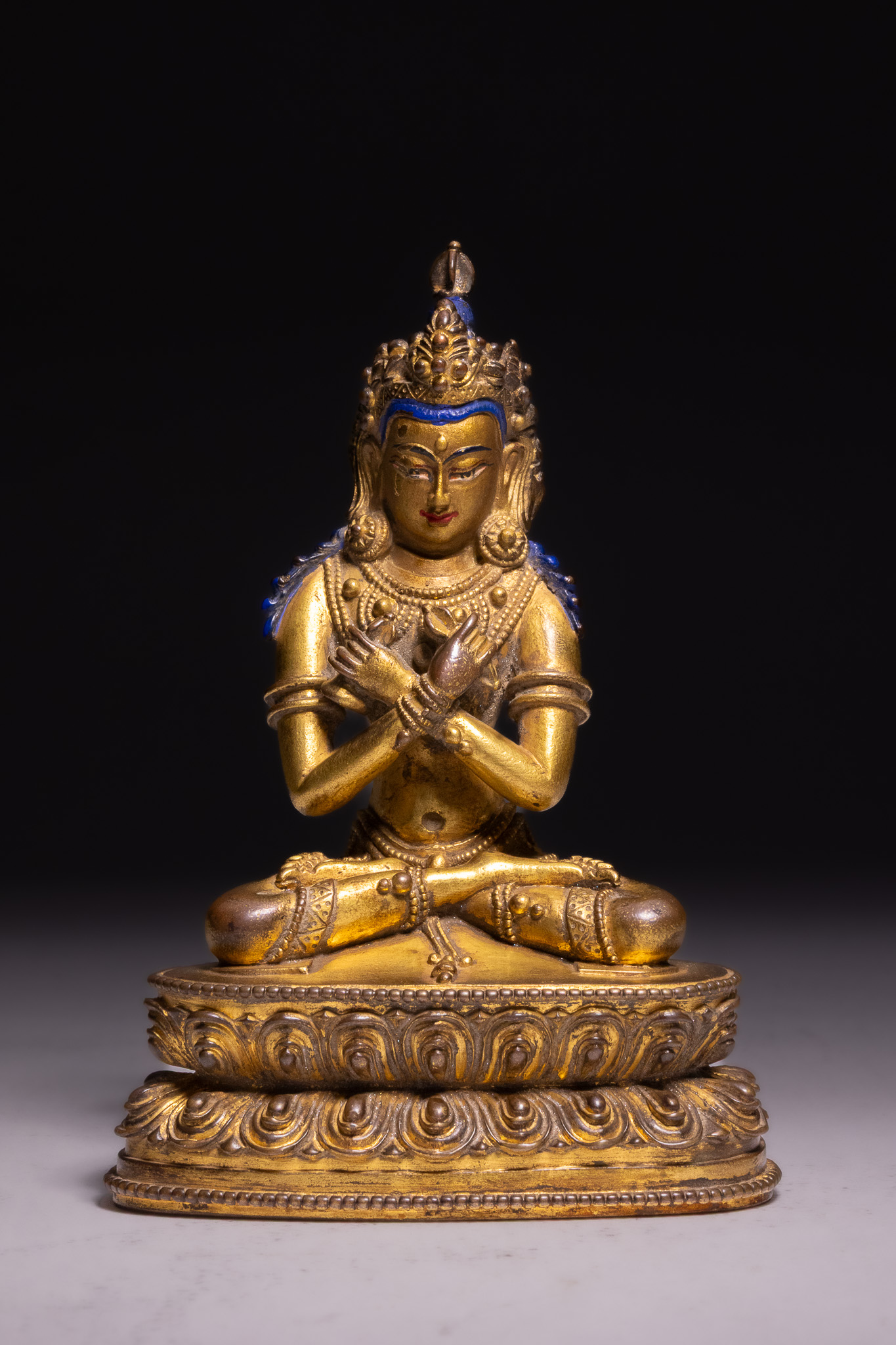 A TIBETAN GILT-BRONZE FIGURE OF VAJRADHARA, 18TH-19TH CENTURY